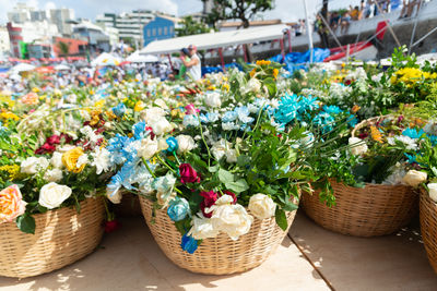 Several chests of flowers carried during a party for iemanja on rio vermelho beach