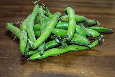 High angle view of green chili pepper on table