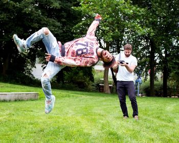 Full length of a man jumping in yard