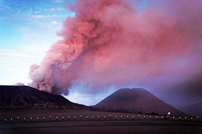 Scenic view of volcanic mountain against sky