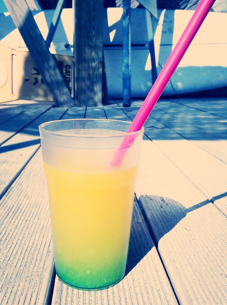 drink, food and drink, refreshment, table, drinking glass, freshness, drinking straw, still life, close-up, wood - material, cocktail, focus on foreground, yellow, alcohol, juice, no people, indoors, sunlight, day, glass - material