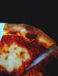 Close-up of breakfast on black background