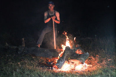 Bonfire on field at night