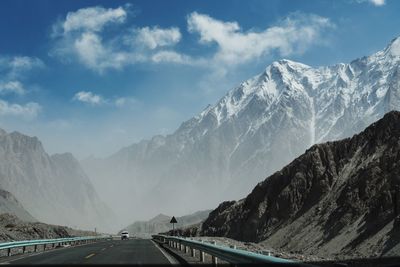 Scenic view of snowcapped mountains against sky