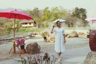 Portrait of smiling woman outdoors