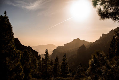 Scenic view of mountains against sky during sunset