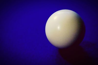 Electric lamp against black background