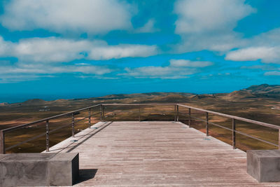 Observation point over landscape against sky