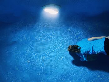 Girl swimming in pool