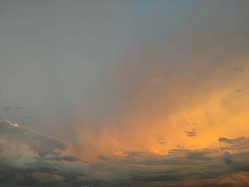 Low angle view of dramatic sky during sunset