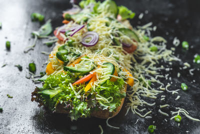 High angle view of chopped vegetables in container