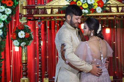 Couple kissing in a temple