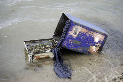 High angle view of abandoned boat in water