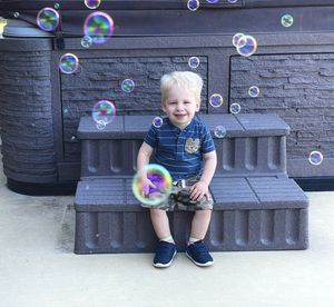 Boy playing with toy blocks