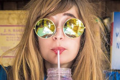 Close-up of woman drinking