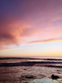 Scenic view of sea against sky at sunset