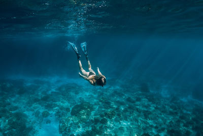 Man swimming in sea