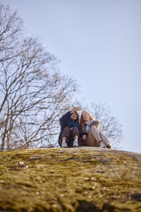 Young women taking selfie in park