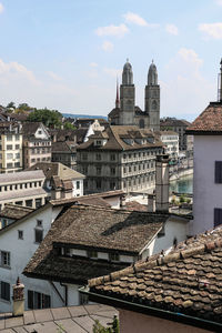 High angle view of buildings in city against sky