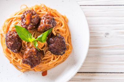 High angle view of pasta in plate on table