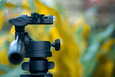 Close-up of camera photographing