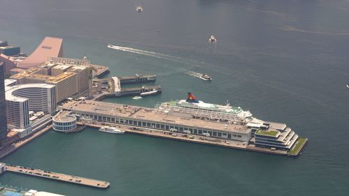 High angle view of ship by sea in city