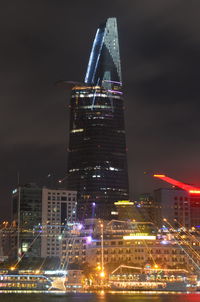 Illuminated buildings in city at night
