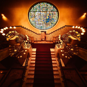 Low angle view of illuminated staircase in building