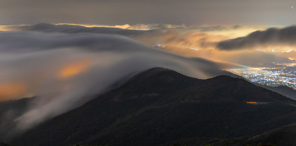 Scenic view of mountains against sky during sunset