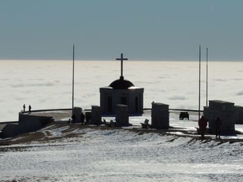 Scenic view of sea against clear sky during winter