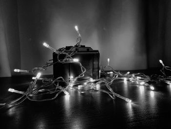 Close-up of electric lamp on table