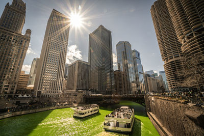 Modern buildings in city against sky