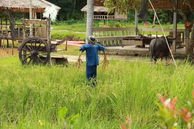 Full length of man on field