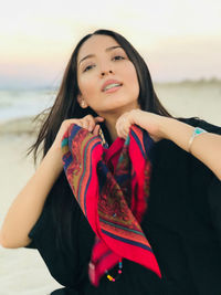 Portrait of beautiful young woman on beach