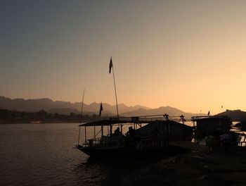 Scenic view of silhouette mountain against sky during sunset