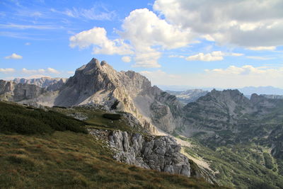 Scenic view of landscape and mountains against sky