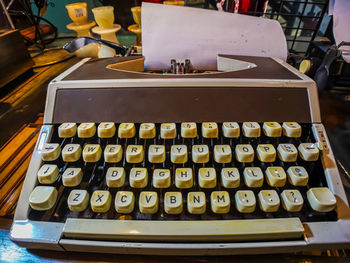 Close-up of typewriter on table