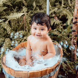 Portrait of boy in basket