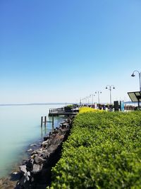 Scenic view of sea against clear blue sky