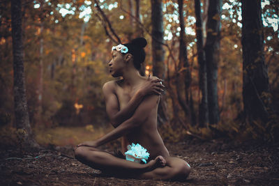 Young woman in forest