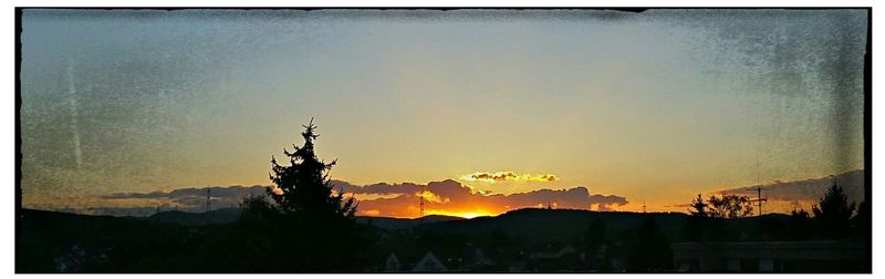 Scenic view of mountains at sunset
