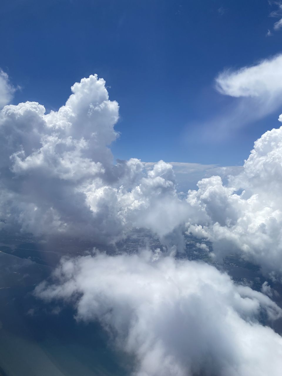 LOW ANGLE VIEW OF CLOUDS AGAINST BLUE SKY