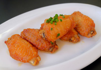High angle view of meat in plate on table