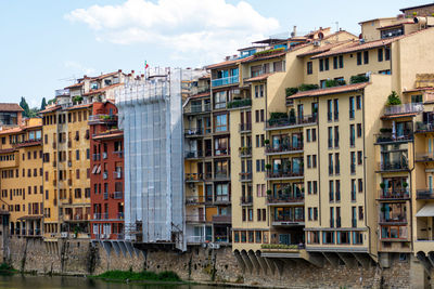 Facades of traditional italian buildings by the river arno, florence, tuscany, italy
