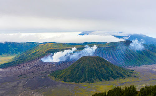 Panoramic view of volcanic landscape against sky