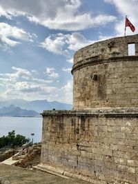 Low angle view of fort against sky