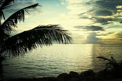 Scenic view of sea against cloudy sky