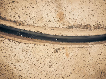 Aerial view of road at desert