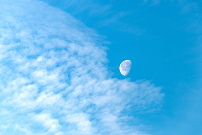 Low angle view of moon in sky