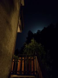 Low angle view of old building against sky at night